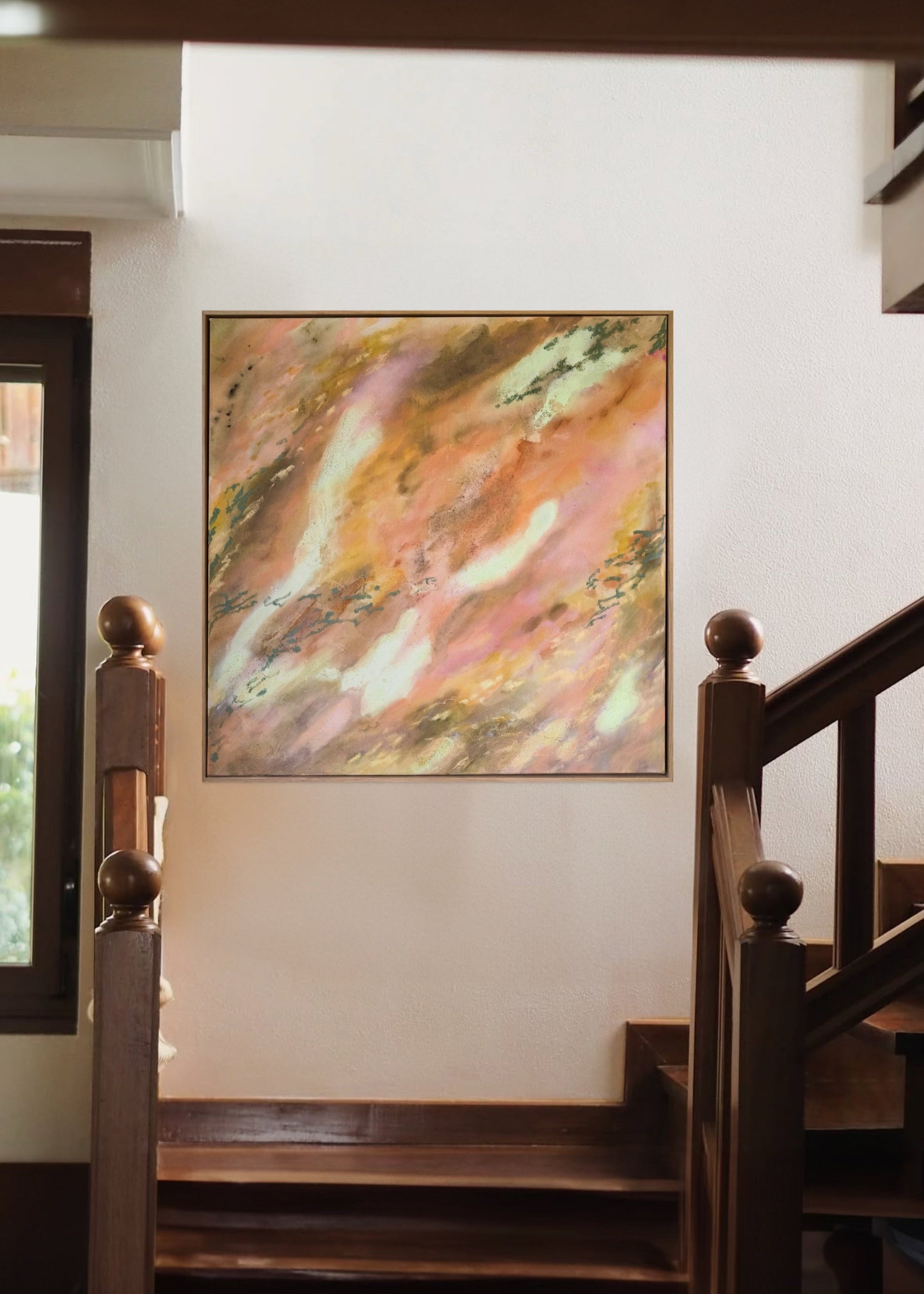 Abstrakt artwork featuring swirling patterns in earthy tones, orange, olive, yellow and pastel tones in turquoise and butter yellow on a textured surface framed in oak wood.