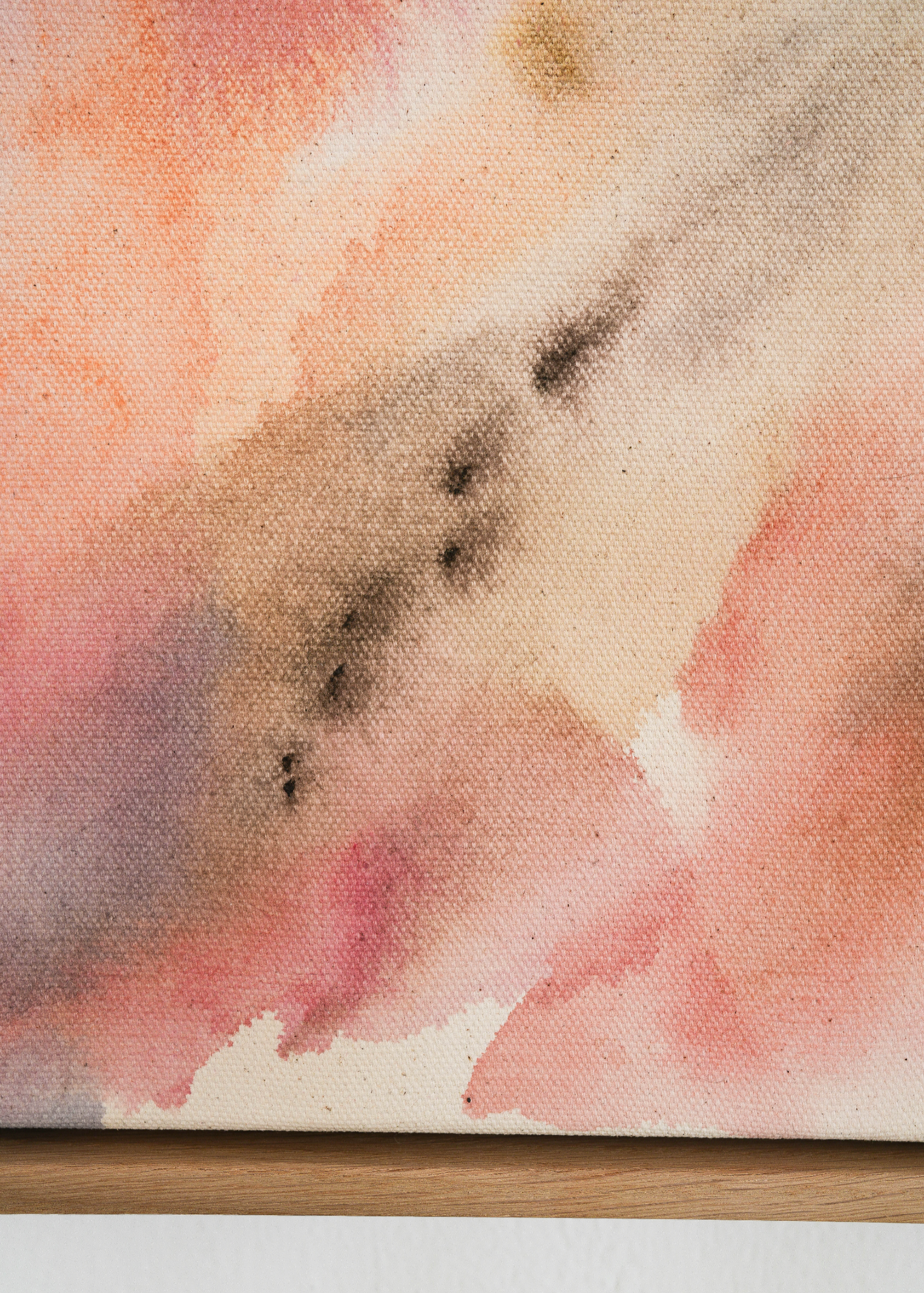 Abstract painting with deep navy brushstrokes layered over soft beige, dusty pink, and muted grey tones. Delicate hand embroidery lines move across the raw cotton canvas, evoking emotional depth and the feeling of inner turbulence and healing.