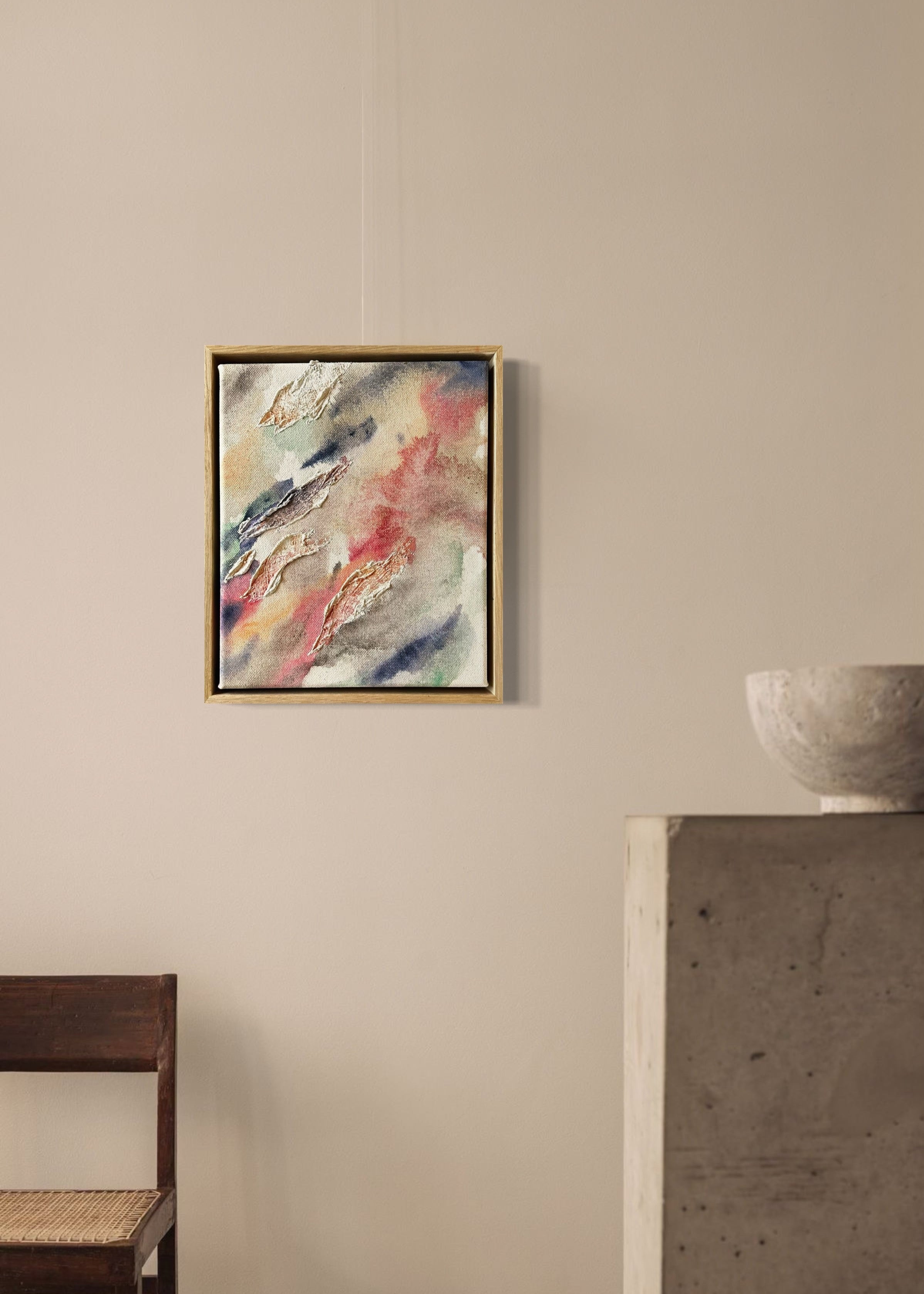 Abstract painting highlighted through organic shaped textures. Featuring colors of beige, pink, green, dark purple and deep blue on a canvas background. Framed in an oak wood frame.