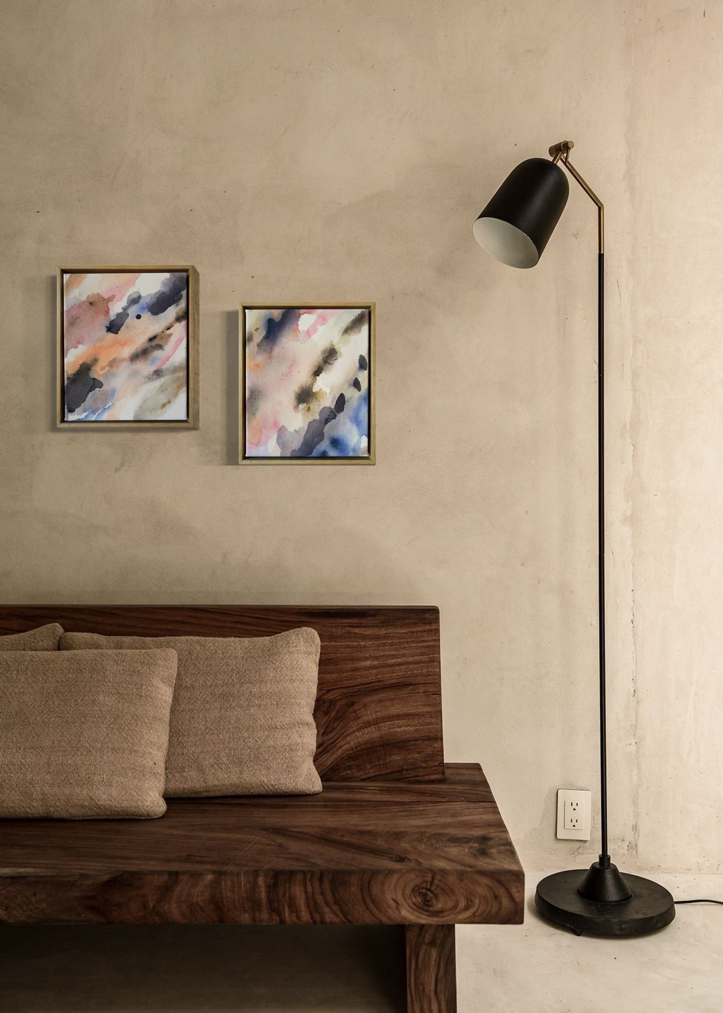 Abstract acrylic painting featuring soft, blended hues of pink, blue, and gray in flowing, harmonious patterns, framed in light wood. Radiates a subtle, tranquil tone perfect for creating a calming atmosphere.