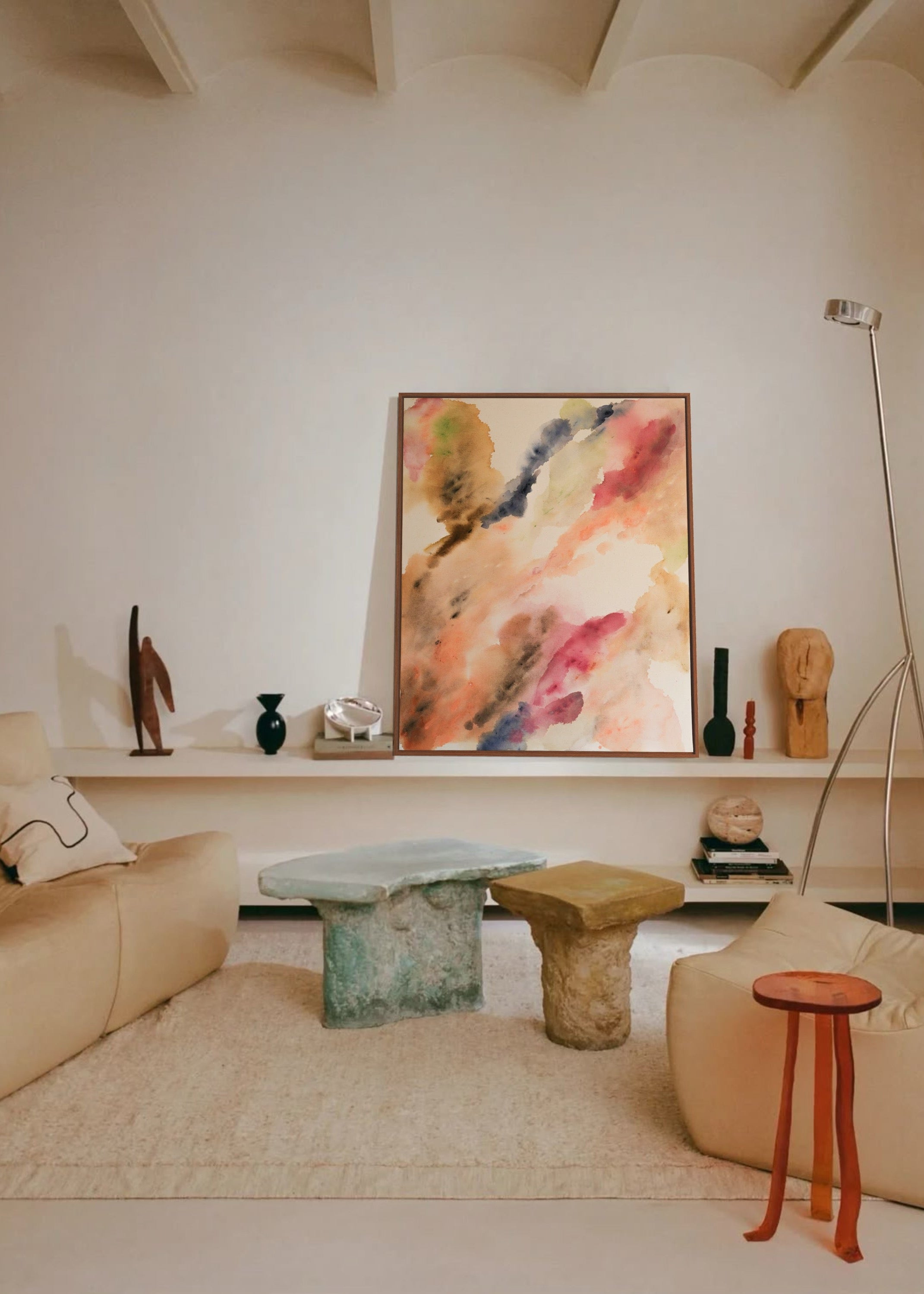 Abstract watercolor in earthy tones such as beige, rose, orange, and brown, with touches of blue and green. The colors flow transparently into one another on a white background, framed in a slim, wooden frame.