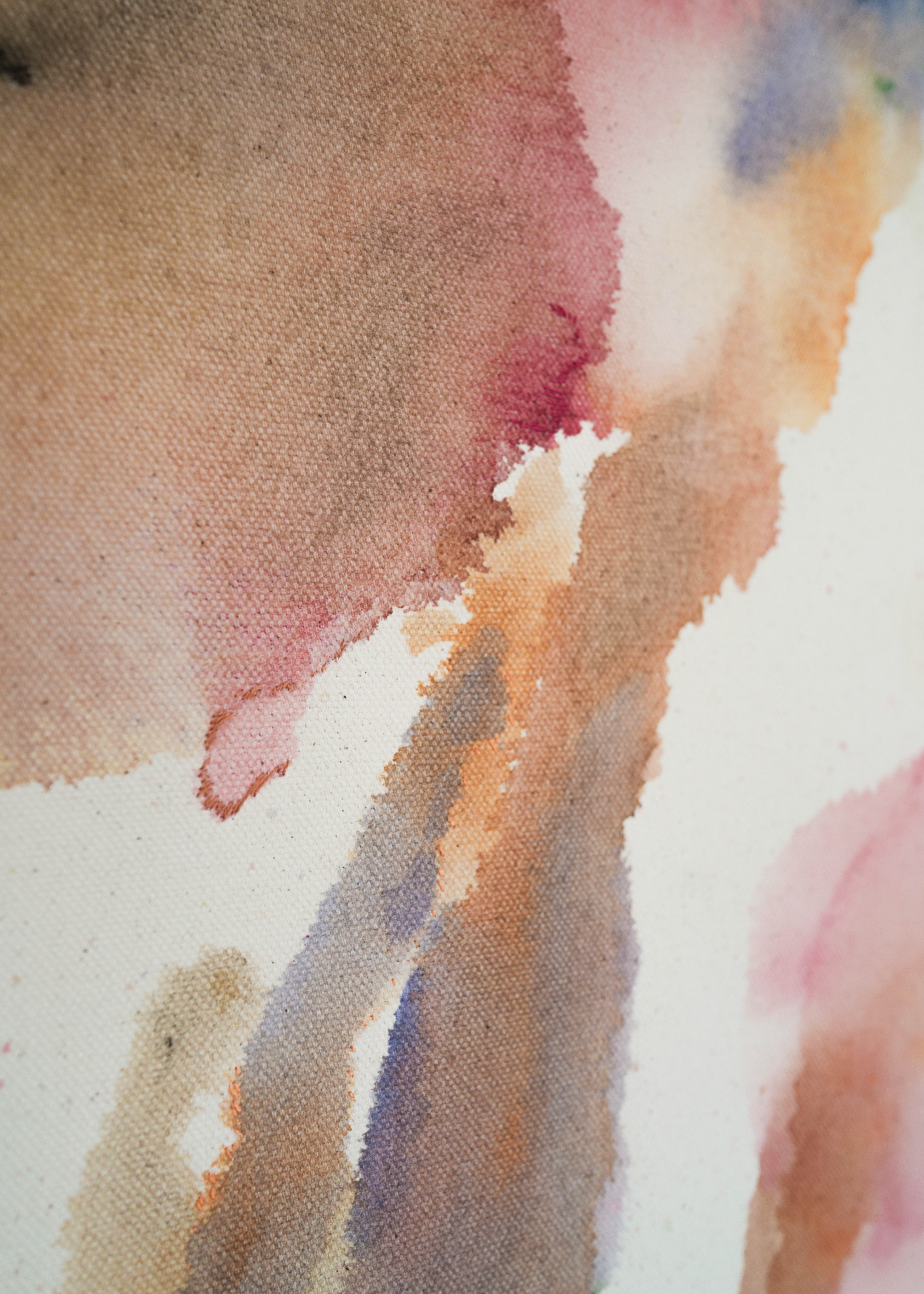 Abstract painting with deep navy brushstrokes layered over soft beige, dusty pink, and muted grey tones. Delicate hand embroidery lines move across the raw cotton canvas, evoking emotional depth and the feeling of inner turbulence and healing.