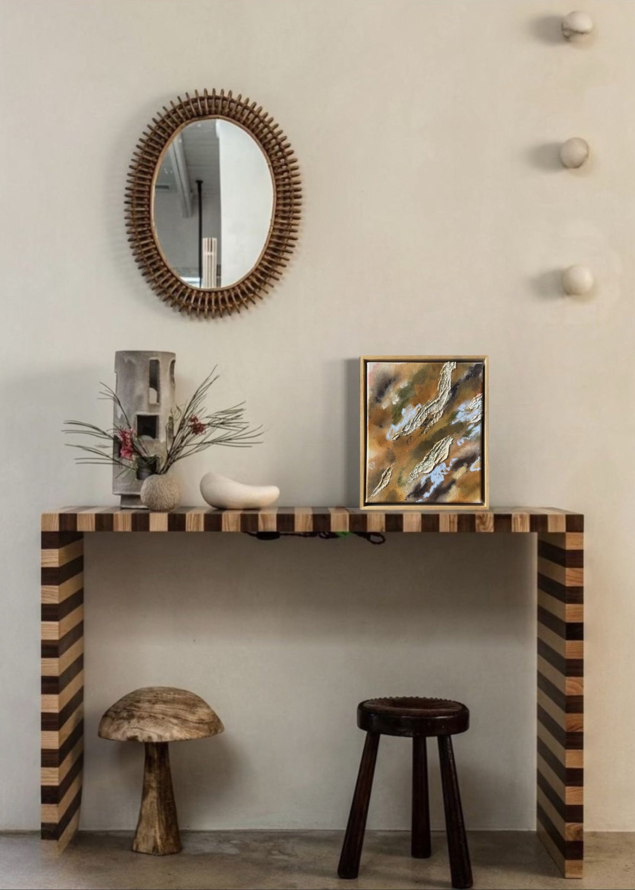 Abstract painting with textured, layered elements in shades of brown, green, and blue. The canvas features irregular shapes resembling organic forms. Framed in oak wood.