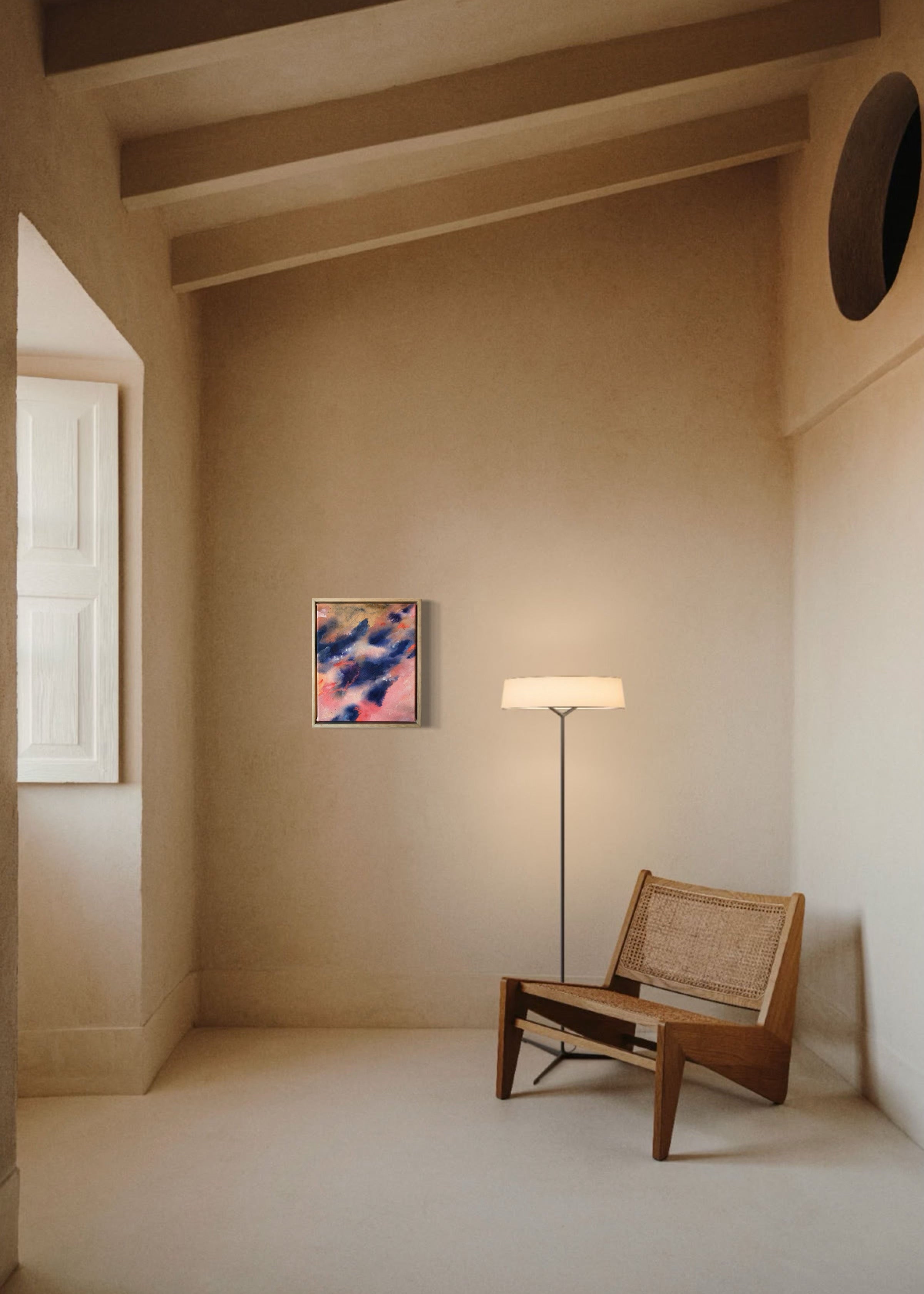 Abstract painting with swirling blue and pink tones, framed in wood, evoking motion and emotion.