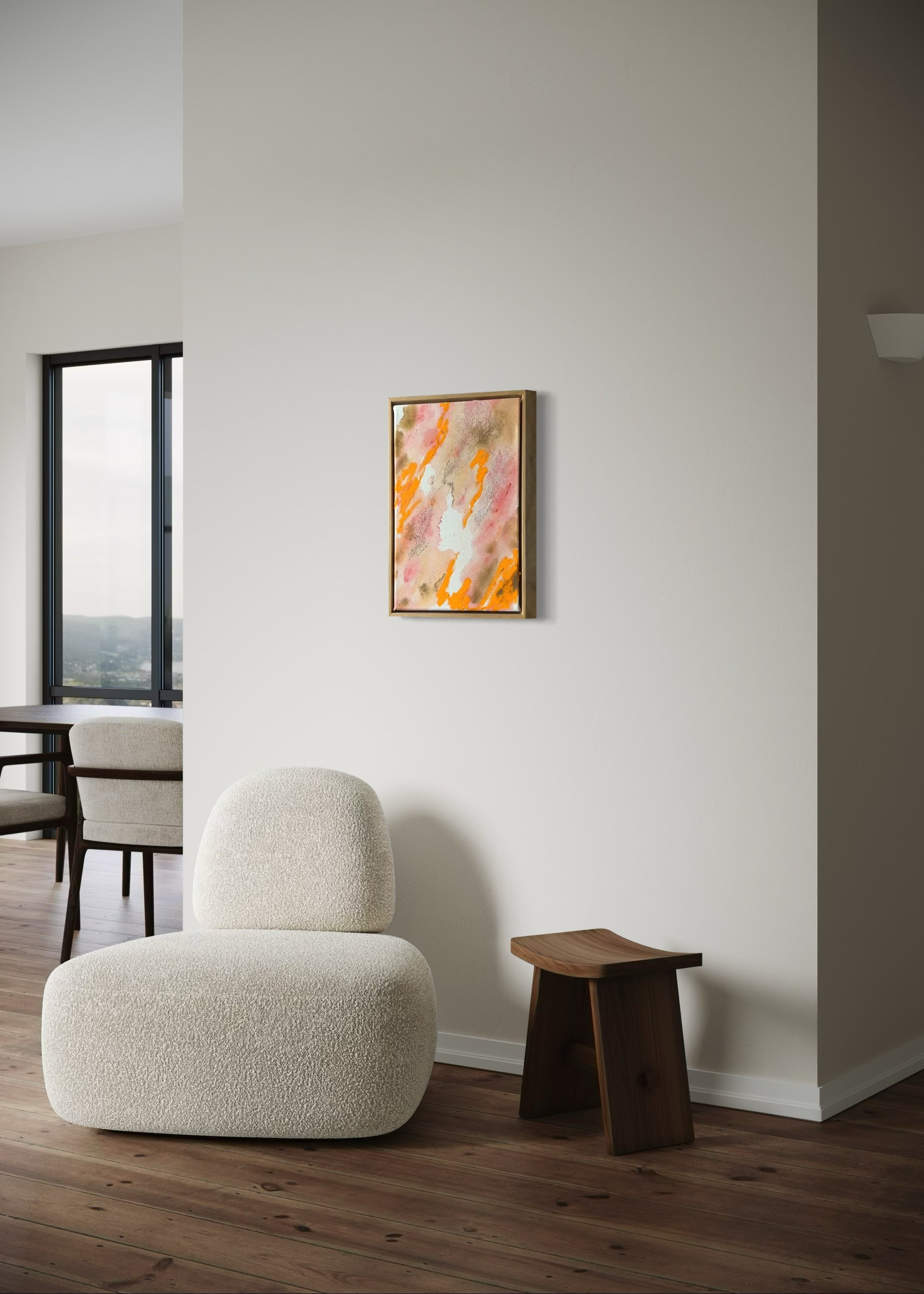 Abstract painting featuring swirling patterns in orange, pink, and beige tones on a textured canvas. Framed in a light wood frame.
