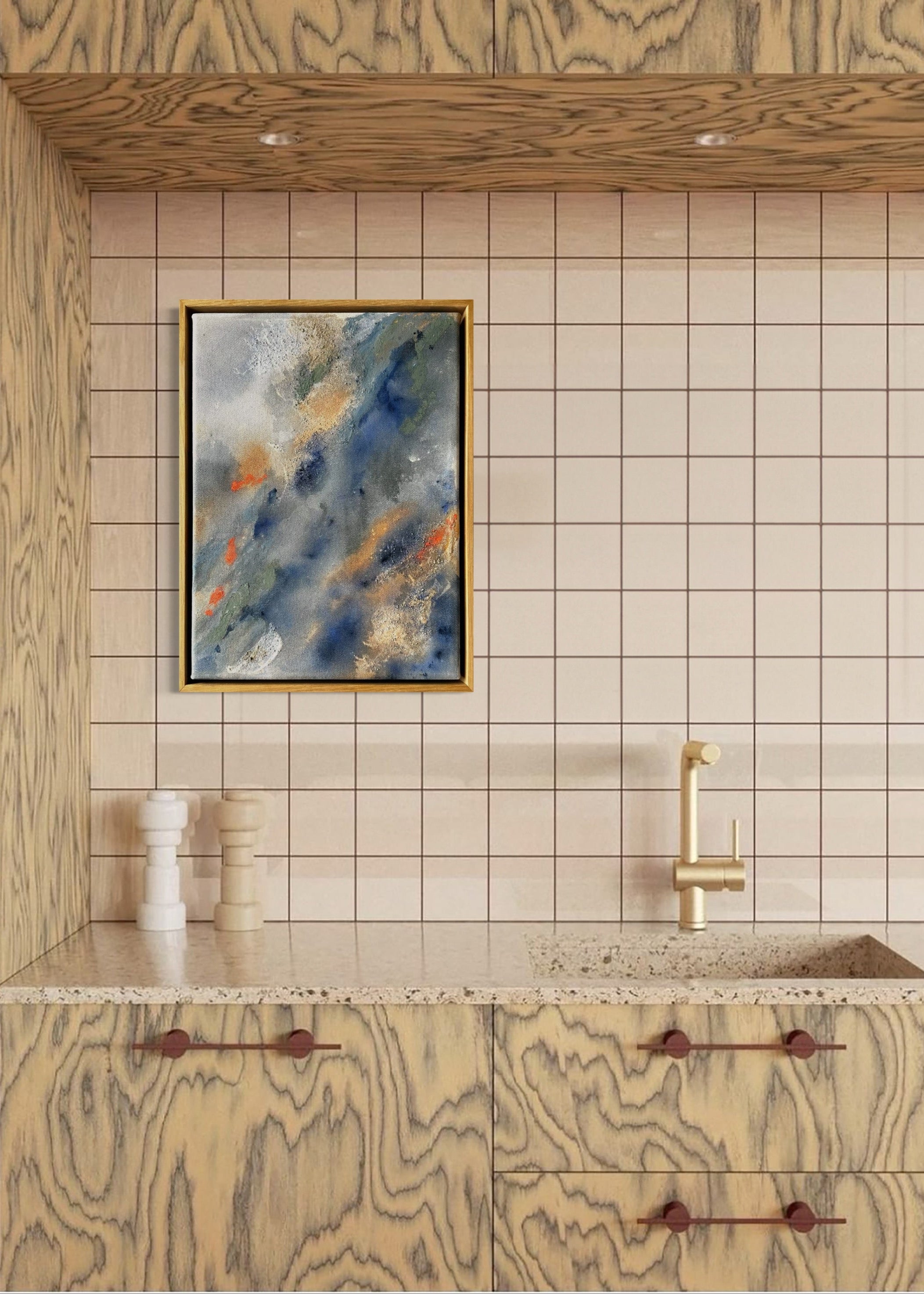 Abstract painting with swirling patterns in shades of blue, gray, green and orange, framed in oak wood.