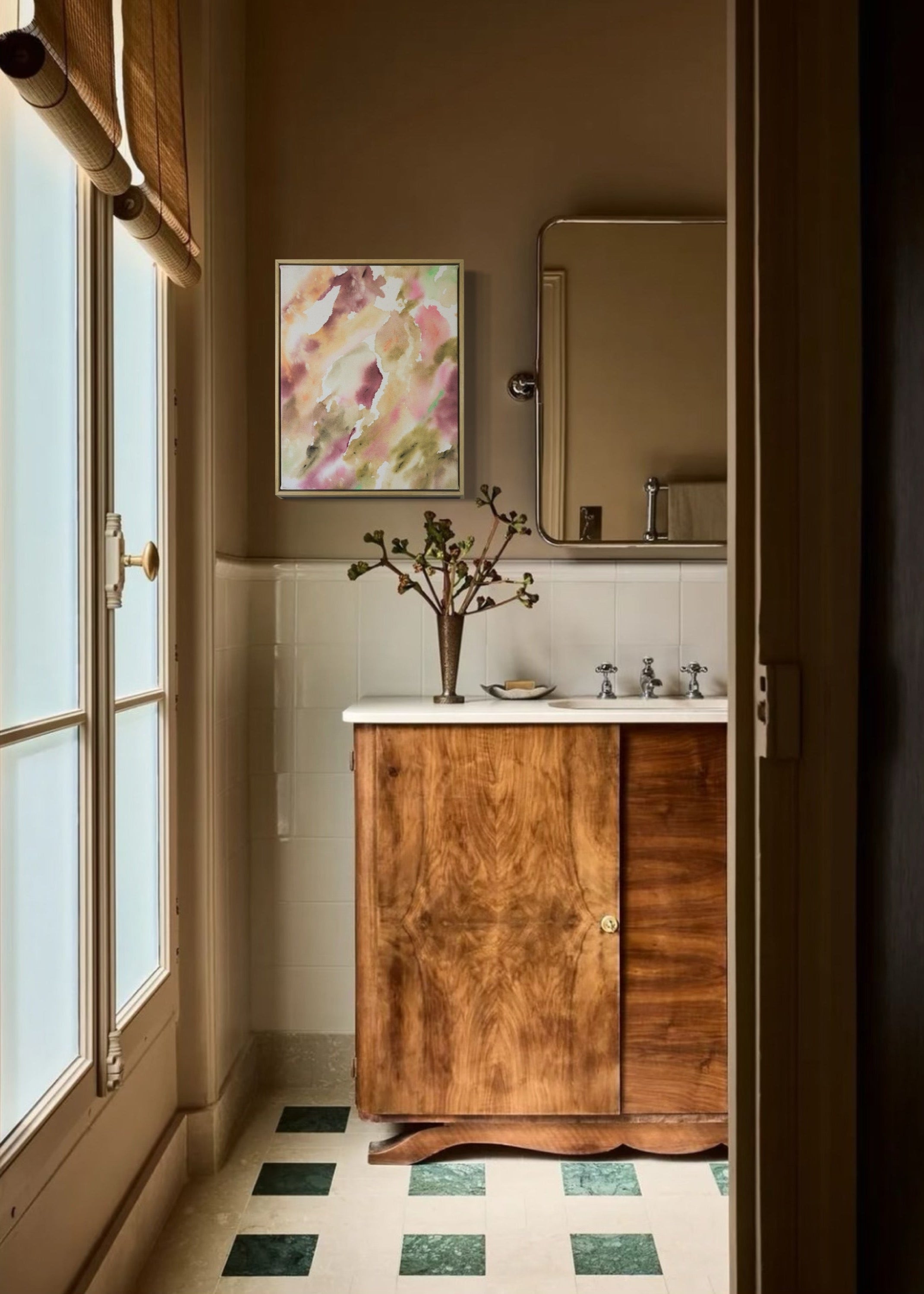 Abstract painting featuring soft, flowing shapes in shades of pink, beige, orange, and green shades, with a textured appearance  framed in oak wood.