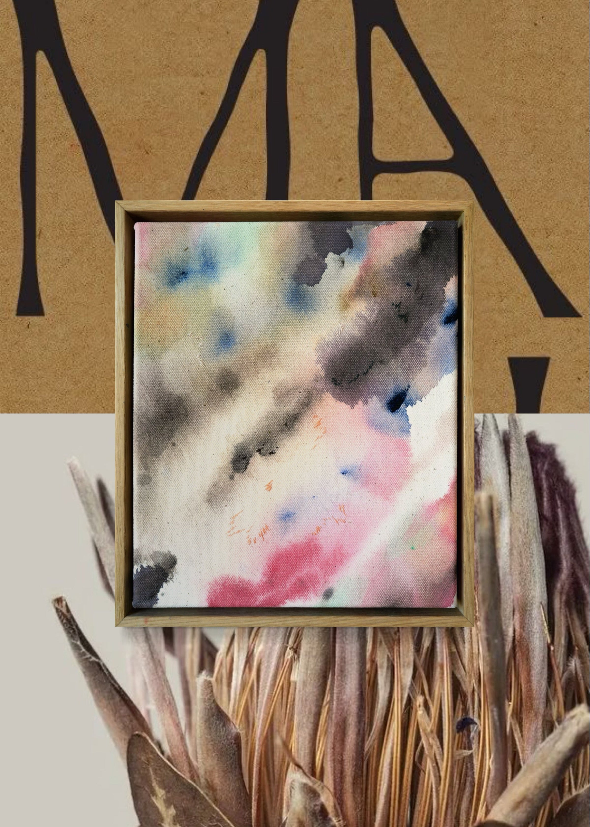 Abstract acrylic, fuid painting in a wooden frame, featuring soft blends of pink, blue, and dark grey. Conveys a dreamy, ethereal mood.