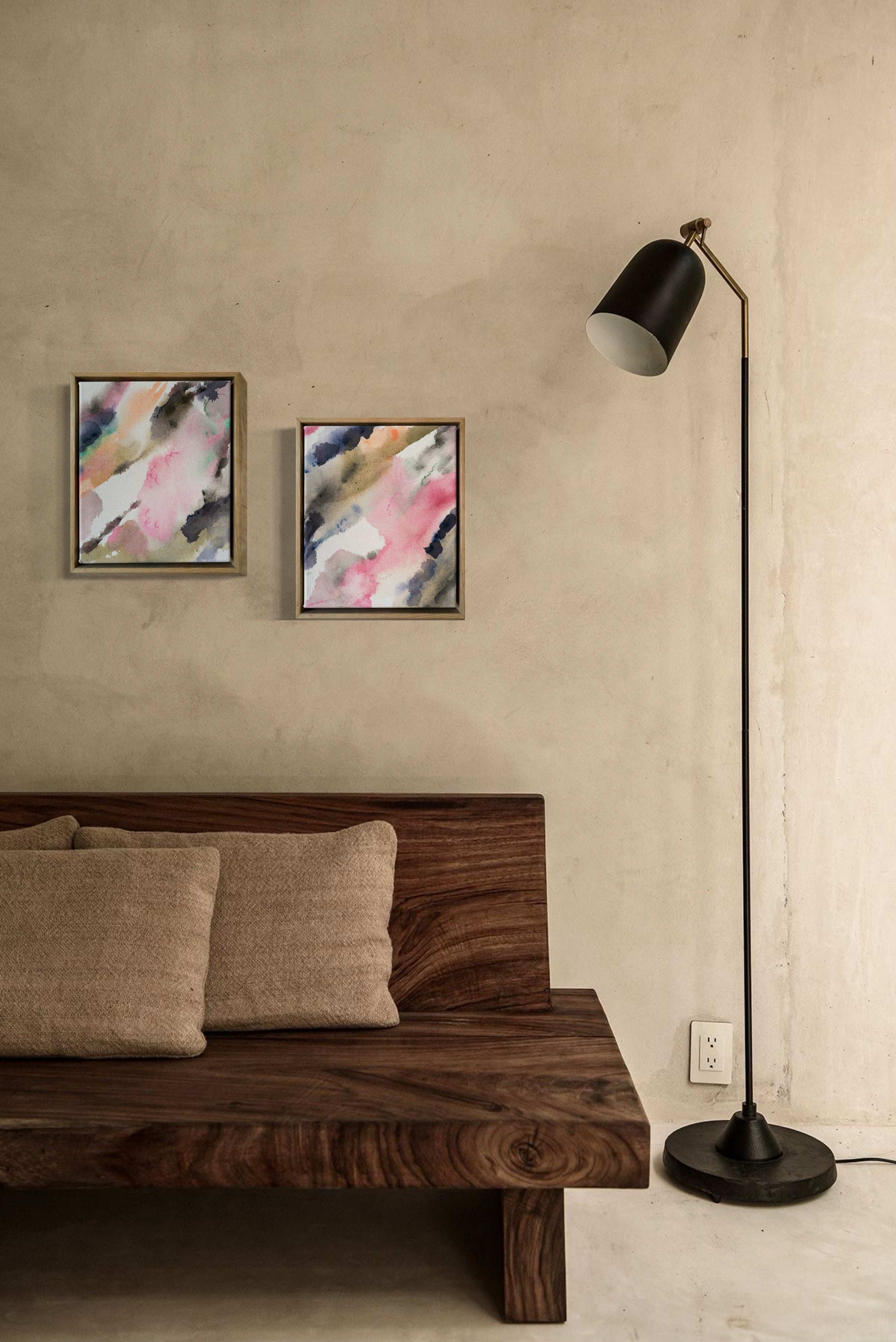Abstract acrylic painting with pink, blue, and gray hues on raw canvas. Bordered by a wooden frame. Conveys a natural, ethereal mood.