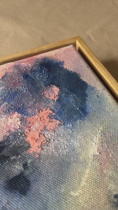 Abstract painting with a textured surface featuring blue, pink, and green hues. The composition includes various brush strokes and splatters.